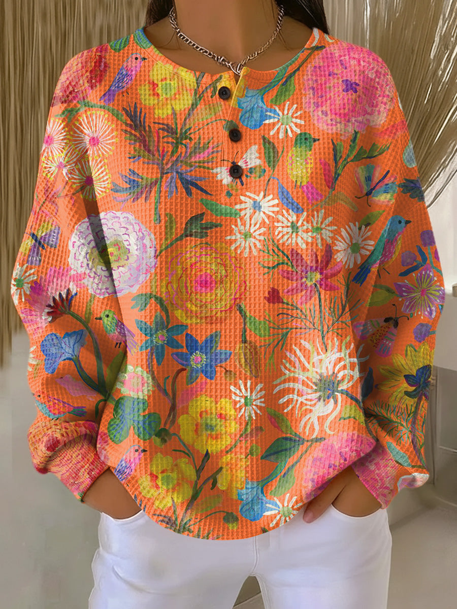 Isabel | Jersey naranja con flores