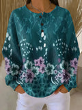 Patricia | Jersey en turquesa con flores